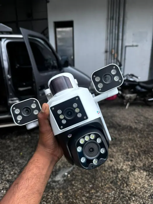 Dual-lens PTZ unit checked over before mounting